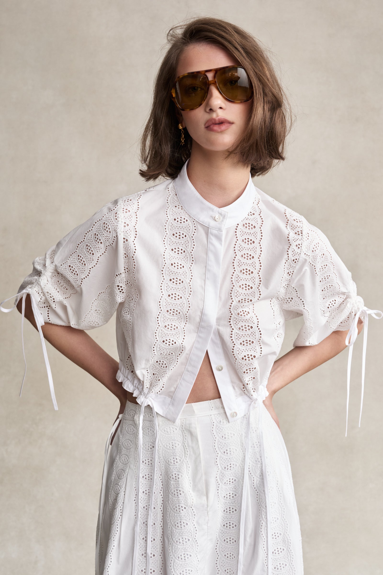 HEVRON Eva Top White Eyelet Crop Shirt, studio shot