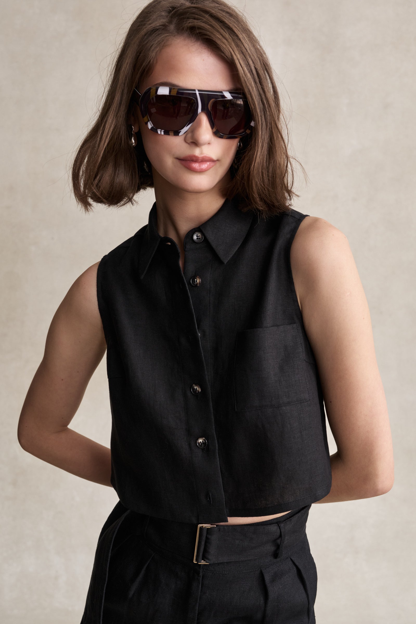 HEVRON Katja Top Black Linen Top, studio shot